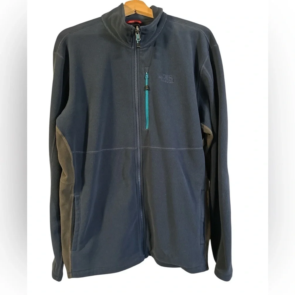 The North Face Navy Blue Fleece with Teal Accent Pocket and Dark Gray Side Panel